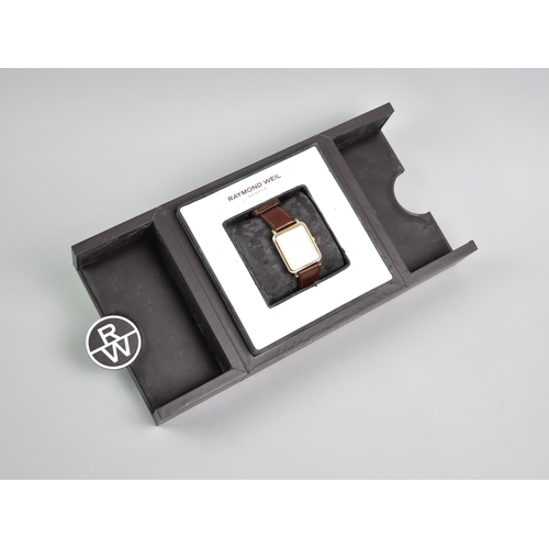 46 - A Boxed Raymond Weil Wristwatch, Textured White Face with Gilt Hour Indicators and Hands, Date Apert... 