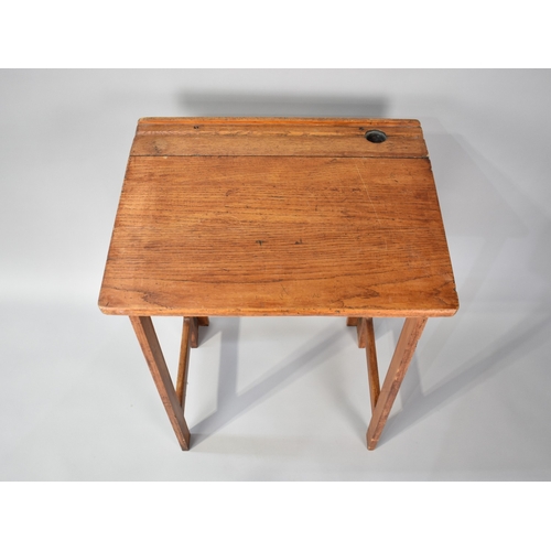 A Vintage Folding Childs Desk with Sloping Writing Surface, 61cms Wide