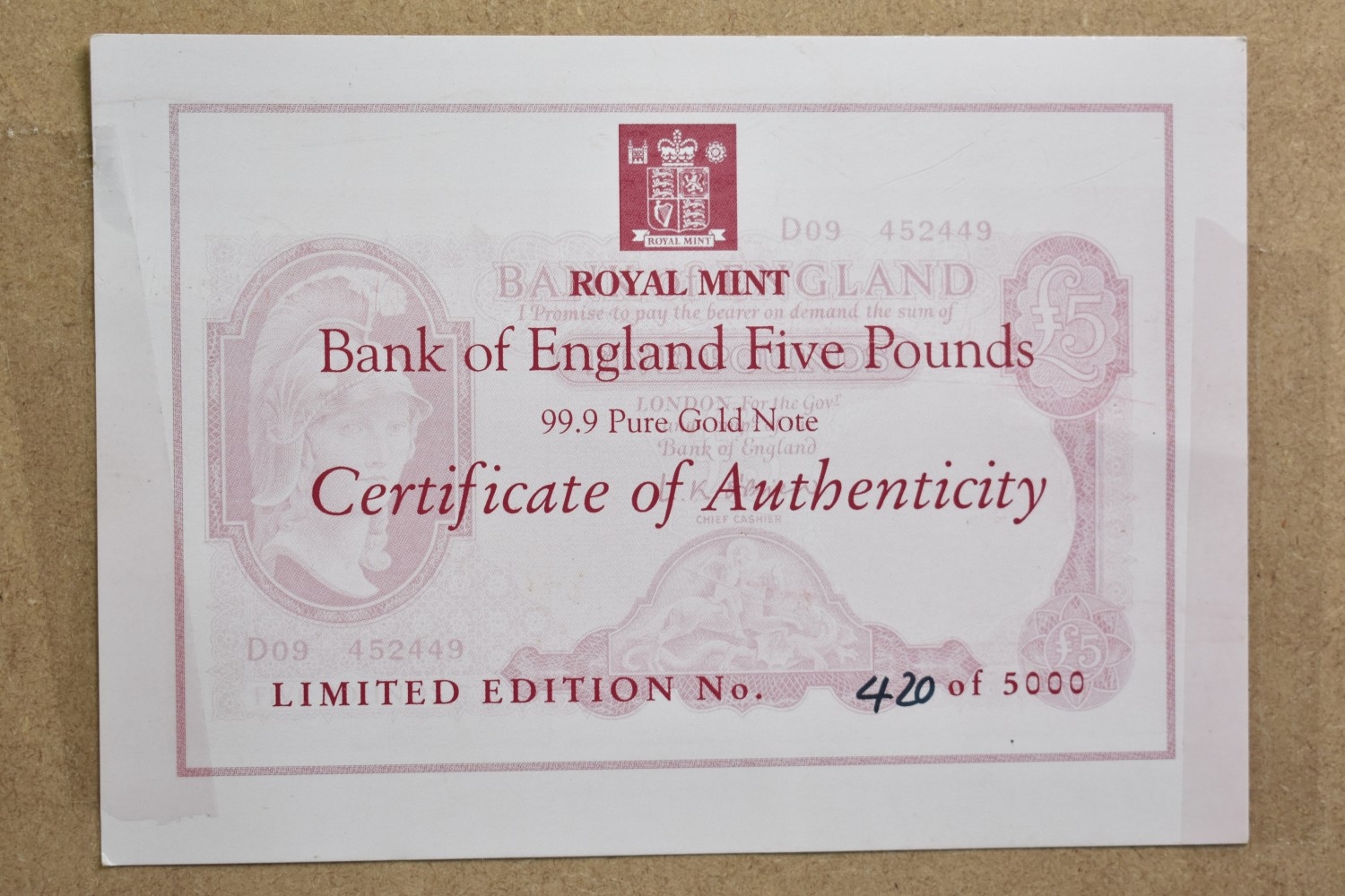 A Framed Royal Mint Bank of England Five Pounds, 99.9% Gold Note, 420/5000