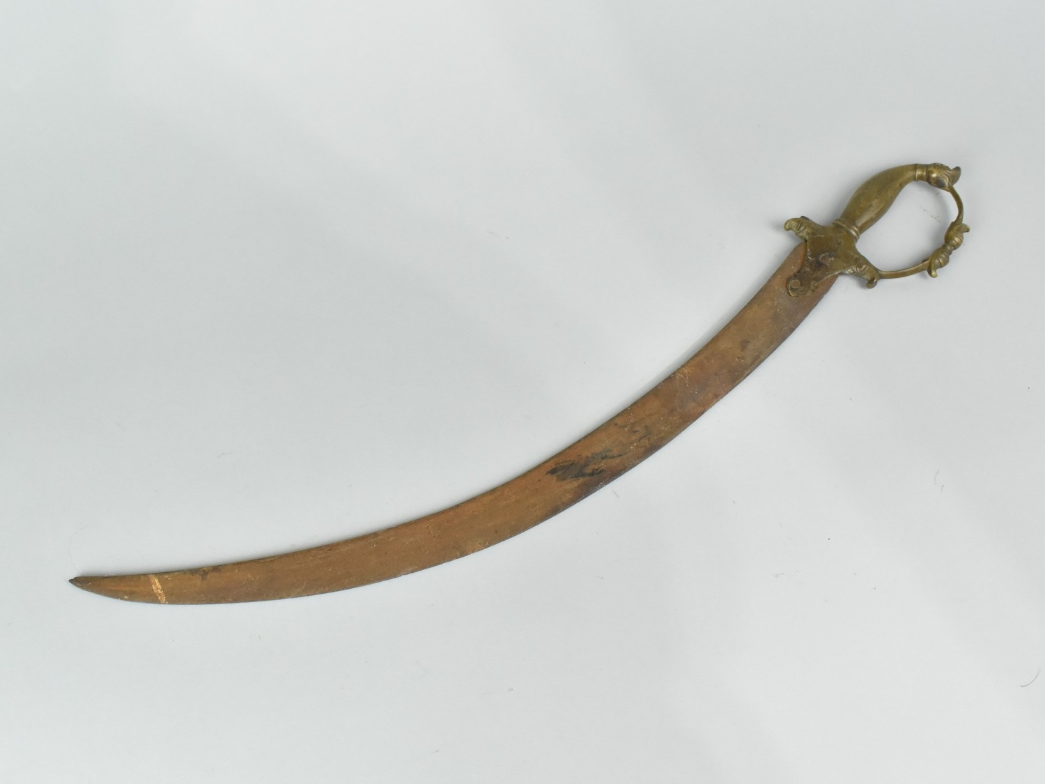 A North Indian Curved Blade Tulwar Short Sword or Dagger with Brass ...