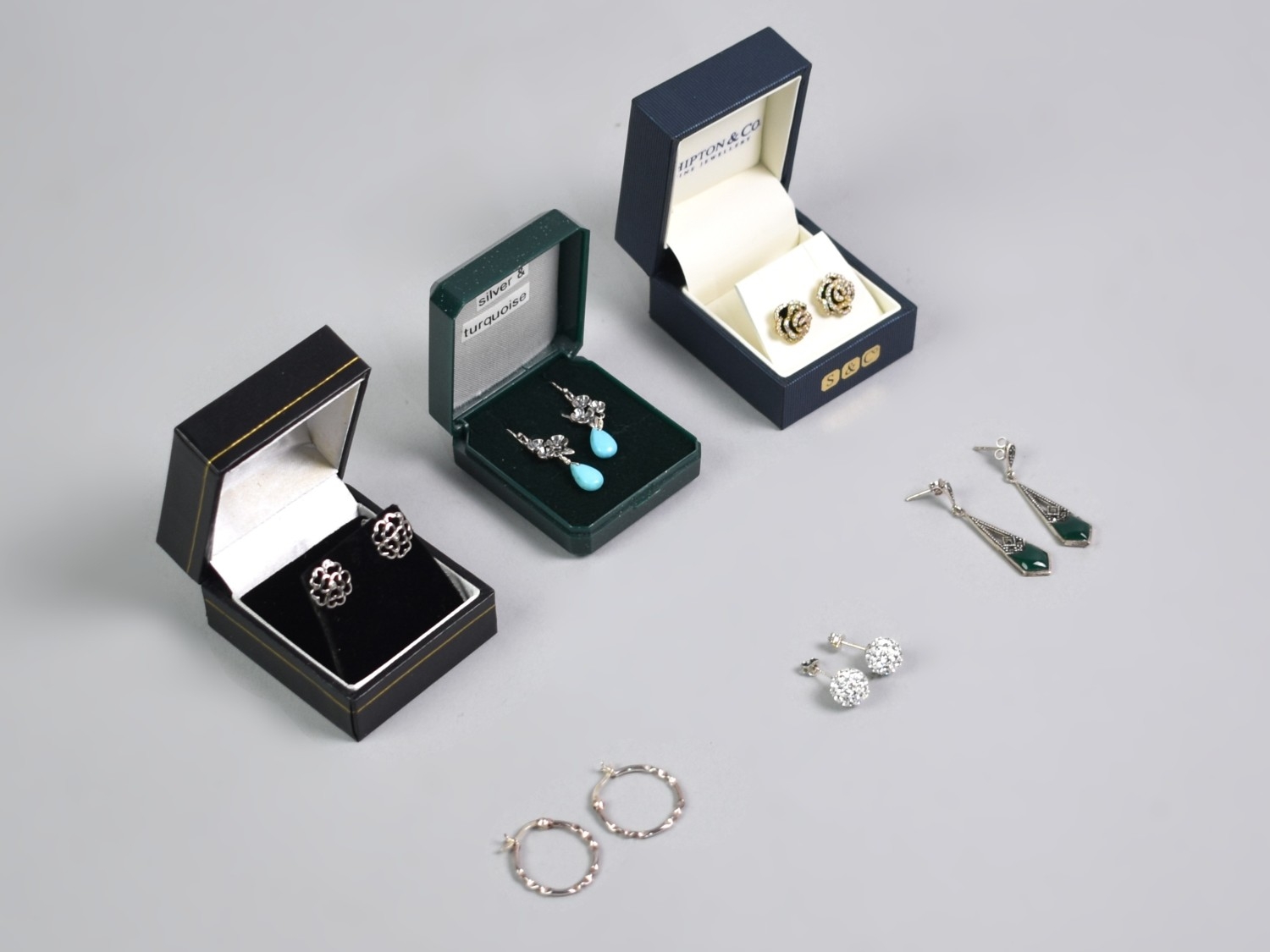 A Collection of Six Pairs of Silver Earrings to include Hooped, Floral ...