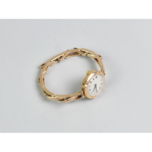 20 - A 9ct Gold Cased Wristwatch on 9ct Gold Expanding Strap, Face with Roman Numerals, Case Measuring 23... 