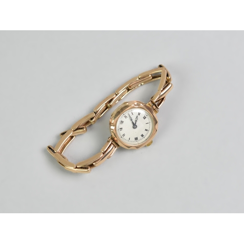 20 - A 9ct Gold Cased Wristwatch on 9ct Gold Expanding Strap, Face with Roman Numerals, Case Measuring 23... 
