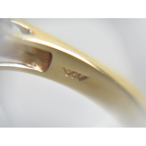 28 - A 14ct Gold and Lavender Jade Dress Ring, Central Oval Cabochon Stone Measuring 10.4mm by 15.1mm Sup... 