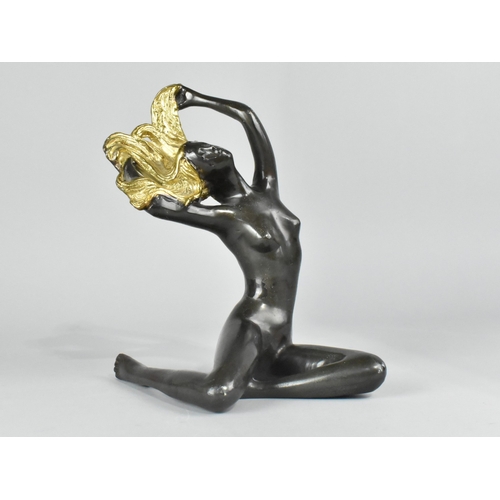26 - A Patinated and Gilded Bronze Study of a Seated Nude, 25cms High