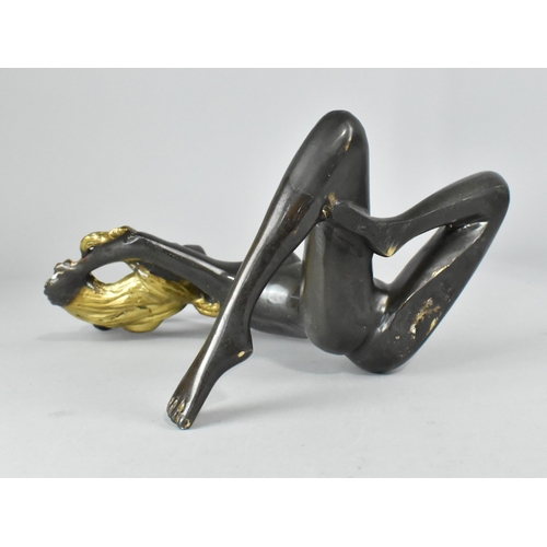 26 - A Patinated and Gilded Bronze Study of a Seated Nude, 25cms High