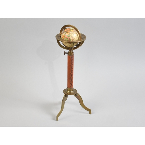 A Reproduction Desktop Rise and Fall Globe on Folding Tripod Base with ...
