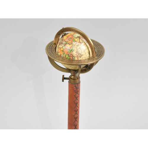 A Reproduction Desktop Rise and Fall Globe on Folding Tripod Base with ...