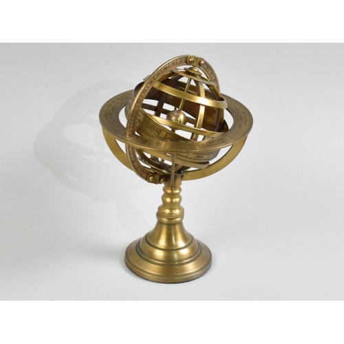 A Reproduction Desktop Brass Armillary Sphere, 21cms High