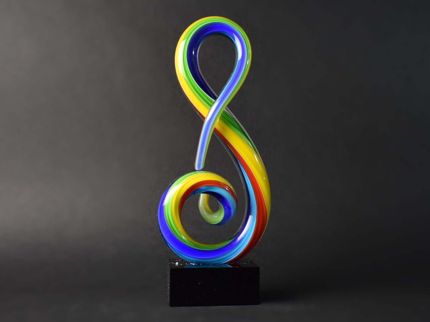 A Modern Murano Style Coloured Glass Treble Clef Design, 31cms High