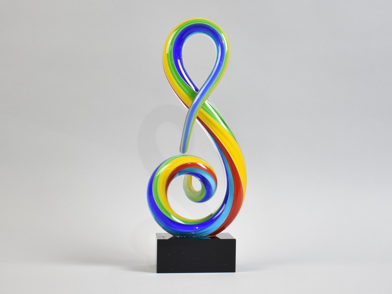 A Modern Murano Style Coloured Glass Treble Clef Design, 31cms High