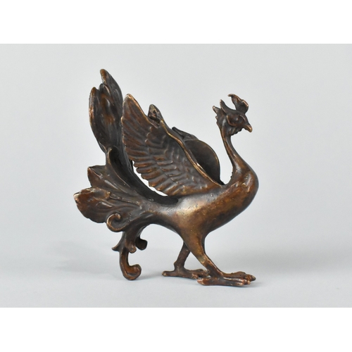 12 - A Chinese Patinated Bronze Study of a Phoenix, 9cms High