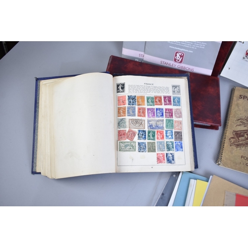 240 - A Collection of Four Vintage School Boy Stamp Albums together with Other Philatelic Accessories