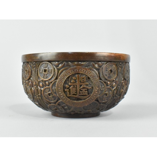 38 - A Reproduction Patinated Bronze Chinese Treasure Bowl, Decorated in Relief with Chinese Coins and In... 