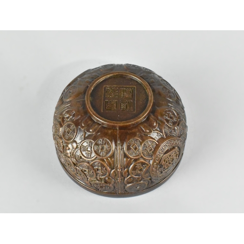38 - A Reproduction Patinated Bronze Chinese Treasure Bowl, Decorated in Relief with Chinese Coins and In... 