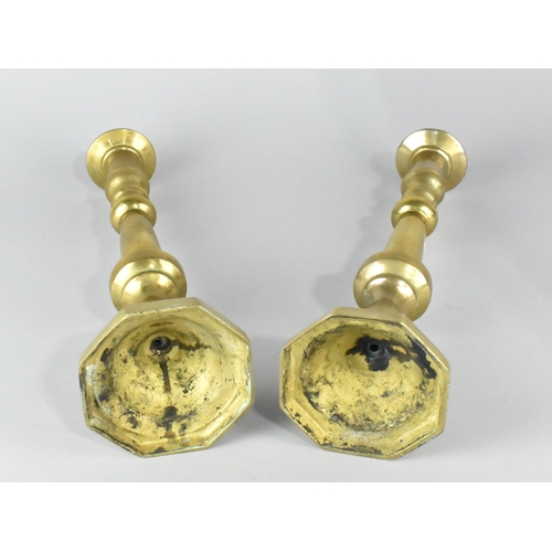 39 - A Pair of Late Victorian/Edwardian Heavy Brass Candlesticks on Octagonal Bases, 35cms High