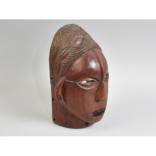 42 - A Mid 20th Century African Tribal Art Mask, 25.5cms High