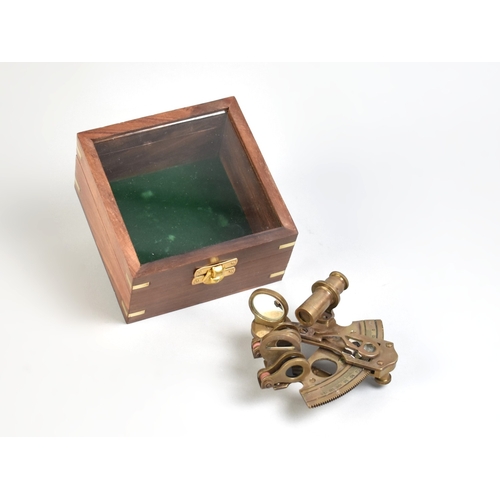 51 - A Reproduction Miniature Cased Brass Sextant