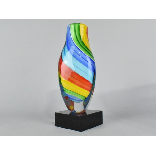 123 - A Murano Style Multicoloured Glass Vase on Plinth Base, 28cms High