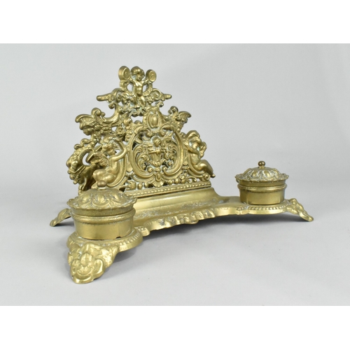 13 - A Reproduction Ornate French Style Brass Desktop Inkstand and Stationery Store, 29cms Wide