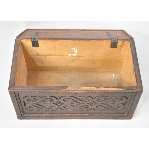 A Carved Rectangular Wooden Chest with Hinged Lid, 58cms by 29cms and ...