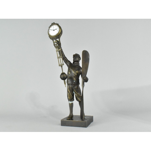 32 - A Reproduction Patinated Bronze Novelty Figural Mystery Clock in the Form of a WWI Pilot with Propel... 