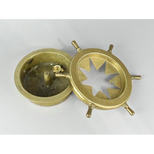 7 - A Heavy Circular Brass Novelty Ashtray in the Form of a Ships Wheel, 23cms Diameter