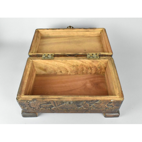 50 - A Mid 20th Century Carved Chinese Wooden Workbox, 35cms Wide