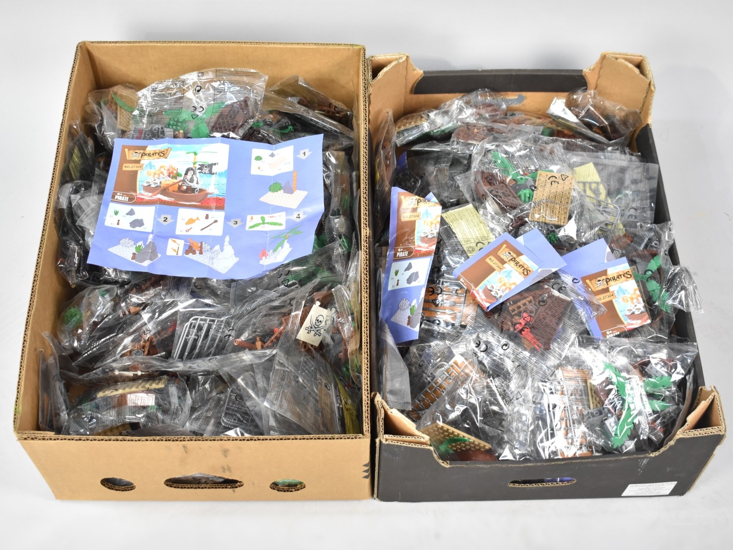 Two Boxes of Construction Toy Pirate Kits, Still in Unopened Bags