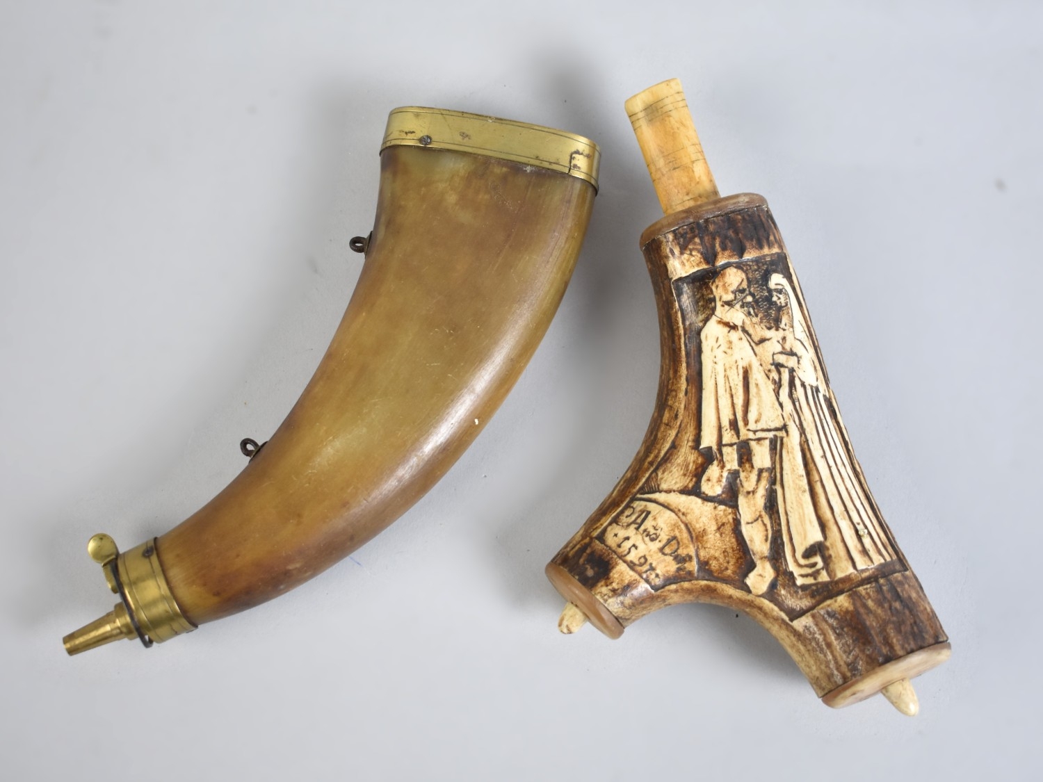 A 19th Century Brass Mounted Horn Shot Flask together with a Carved ...