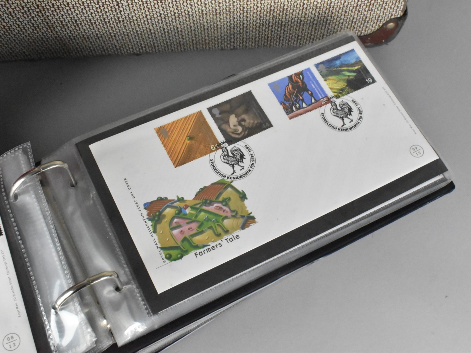 A Vintage Suitcase Containing Four Ring Binders of First Day Covers