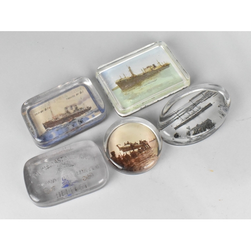 A Collection of Five Advertising Glass Paperweights for Shipping Lines ...