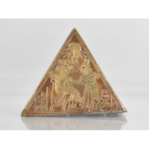 A Small Brass Souvenir Desktop Paperweight in the Form of Pyramid