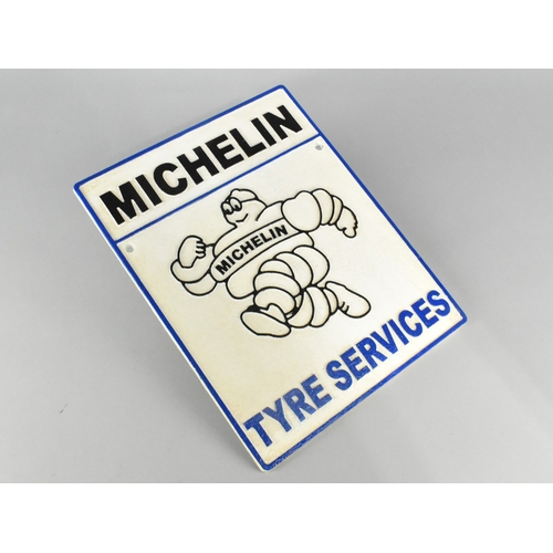 197 - A Reproduction Cold Painted Cast Iron Advertising Sign For Michelin Tyre Services, 24 x 30cms