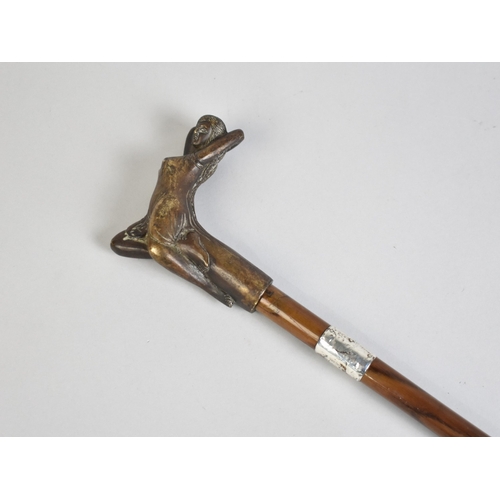209 - A Wooden Walking Cane with Bronze Handle in the Form of Art Nouveau Girl Reclining