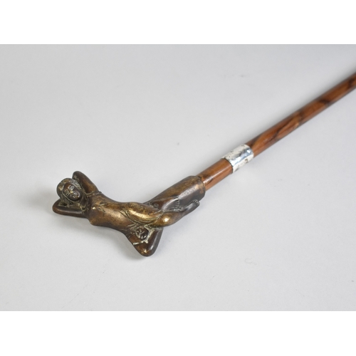 209 - A Wooden Walking Cane with Bronze Handle in the Form of Art Nouveau Girl Reclining