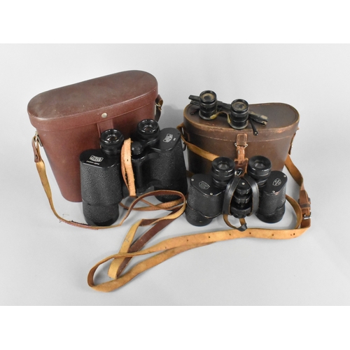 218 - A Pair of Leather Cased Carl Zeiss Jena Jenoptem 10x50 Binoculars together with a Pair of Leather Ca... 