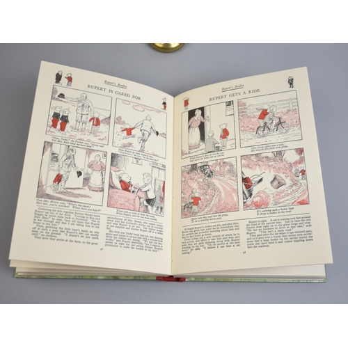 232 - Three Bound Volumes, Mrs Beeton's All About Cookery and Two Rupert Adventure Books