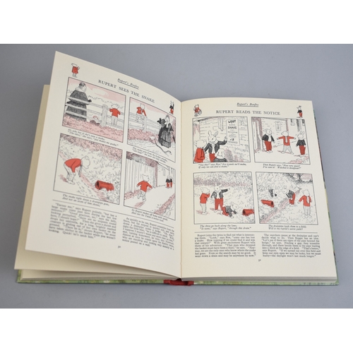 232 - Three Bound Volumes, Mrs Beeton's All About Cookery and Two Rupert Adventure Books