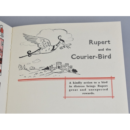 232 - Three Bound Volumes, Mrs Beeton's All About Cookery and Two Rupert Adventure Books