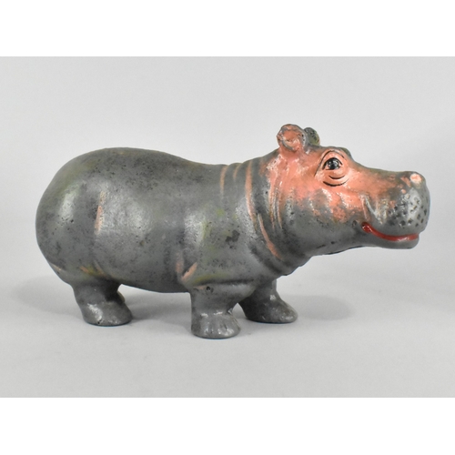 51 - A Cold Painted Cast Iron Novelty Money Bank In The Form Of A Hippo, 20cms Long