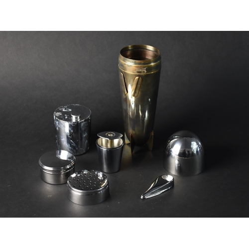 54 - A German Novelty Cocktail Shaker in the Form of a A Zeppelin Airship Containing Various Cups, Boxes ... 