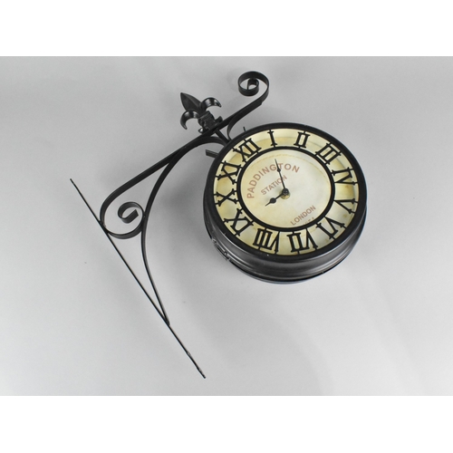 A Reproduction Black Painted Miniature Paddington Station Clock