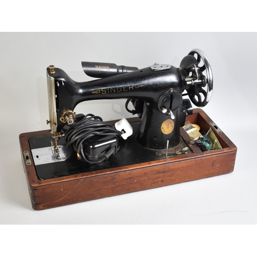 A Cased Singer Manual Sewing Machine