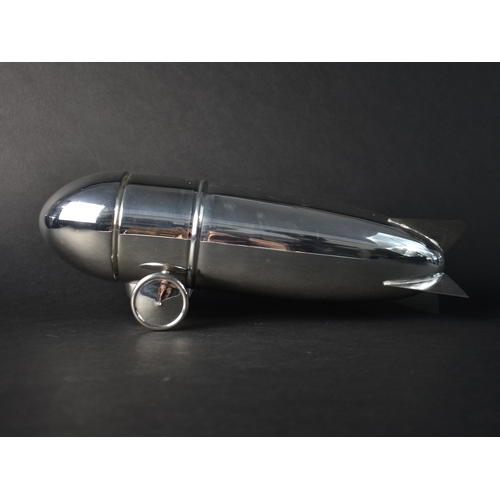 249 - A Silver Plated Novelty Cocktail Shaker in the Form of a Zeppelin Blimp, 32cms Long