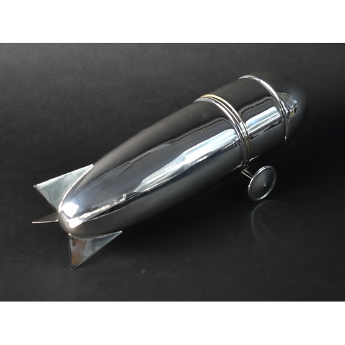 249 - A Silver Plated Novelty Cocktail Shaker in the Form of a Zeppelin Blimp, 32cms Long