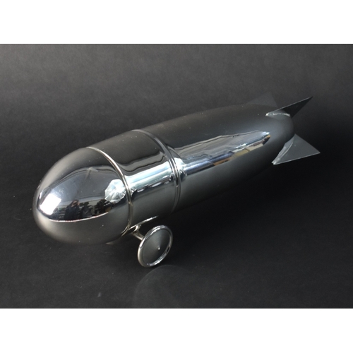 249 - A Silver Plated Novelty Cocktail Shaker in the Form of a Zeppelin Blimp, 32cms Long