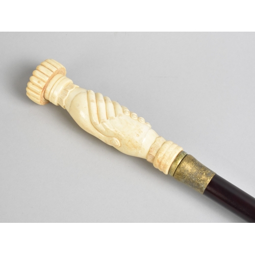142 - A Modern Ebonised Walking Cane with Reproduction Carved Bone Handle in the Form of Two Clasped Hands