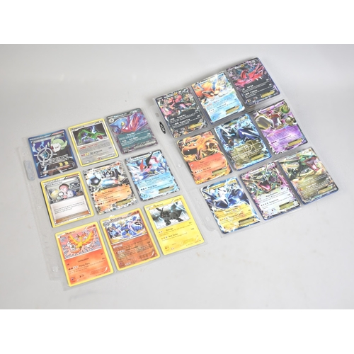 197 - A Collection of Vintage Pokemon Cards to include Charizard, Rayquaza, Ash Greninja, EX's, and Legend... 