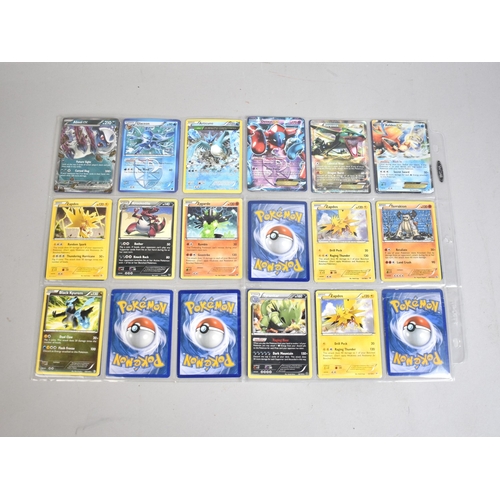 197 - A Collection of Vintage Pokemon Cards to include Charizard, Rayquaza, Ash Greninja, EX's, and Legend... 